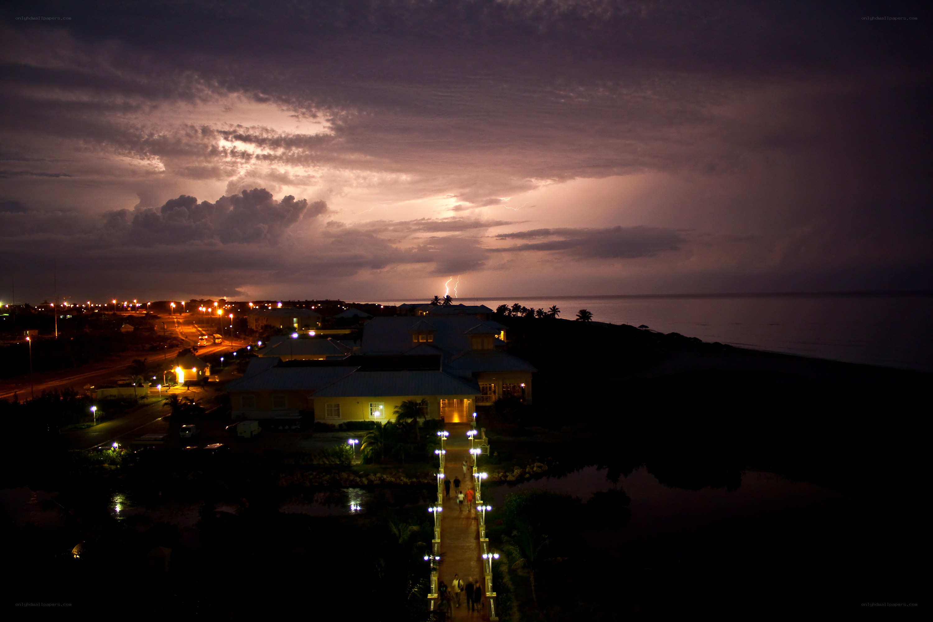 Lightning storm over coastal resort