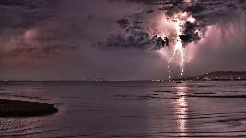 Lightning storm over coastal waters