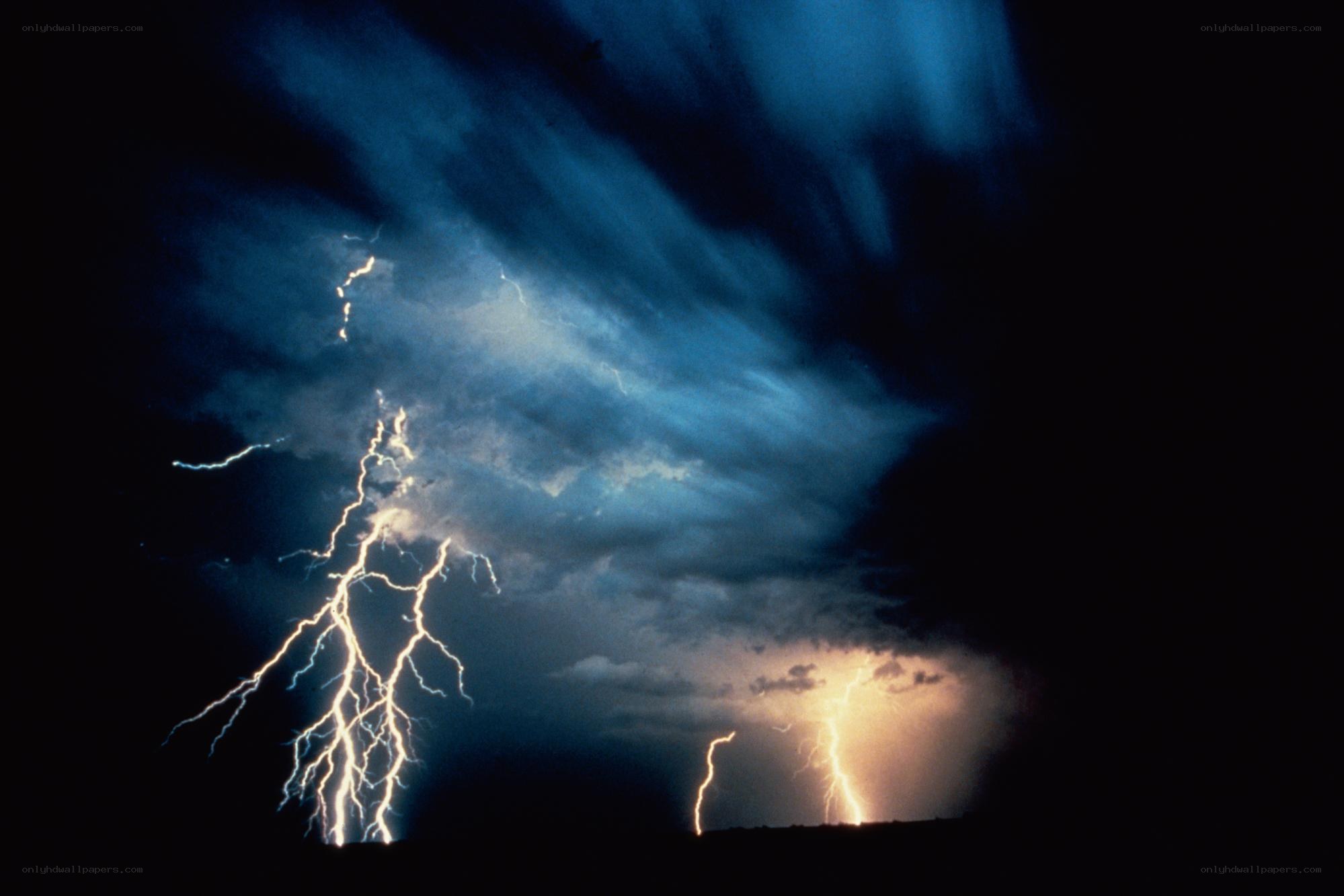 Lightning storm over dark sky
