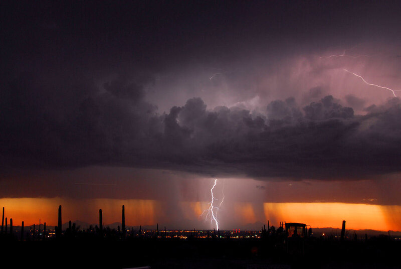 Lightning storm over desert city