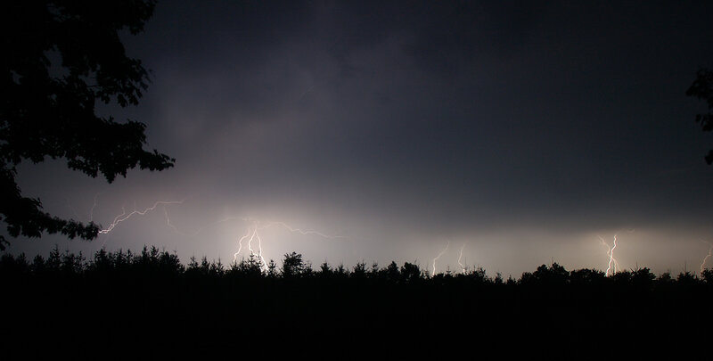 Lightning storm over forest