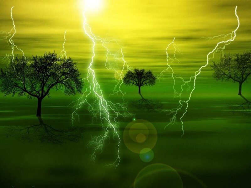 Lightning storm over green field