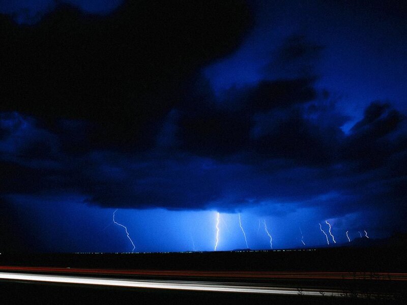 Lightning storm over highway
