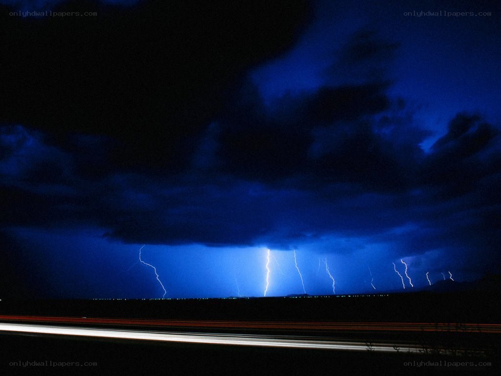 Lightning storm over highway