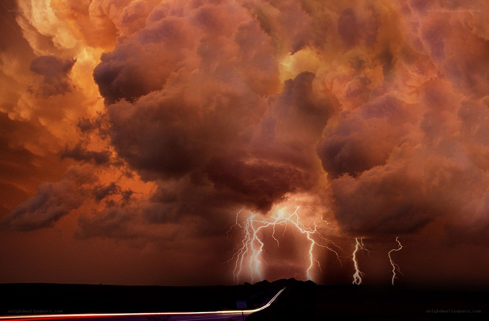 Lightning storm over highway