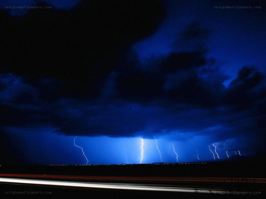 Lightning storm over highway