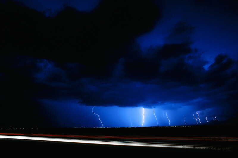 Lightning storm over highway