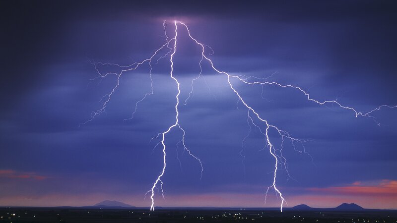 Lightning storm over landscape