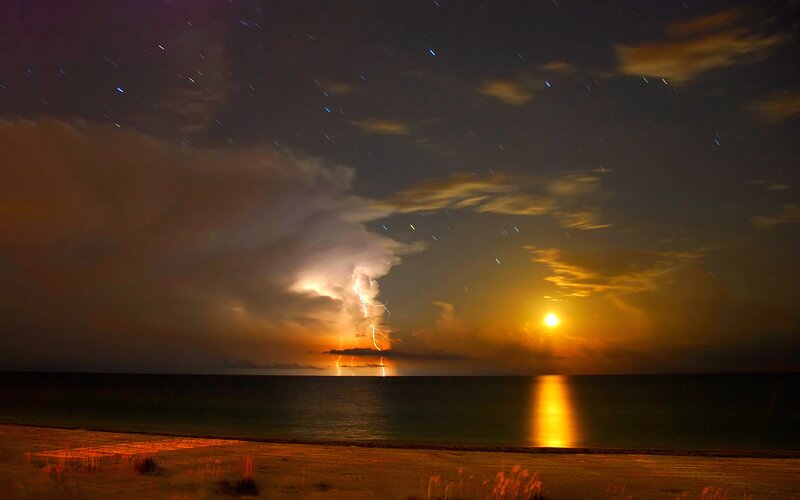 Lightning Storm over Ocean — Orange, Dramatic