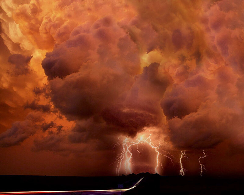 Lightning Storm over Road — Orange, Dramatic, Night, Photograph, Clouds, Mountains, Black, White