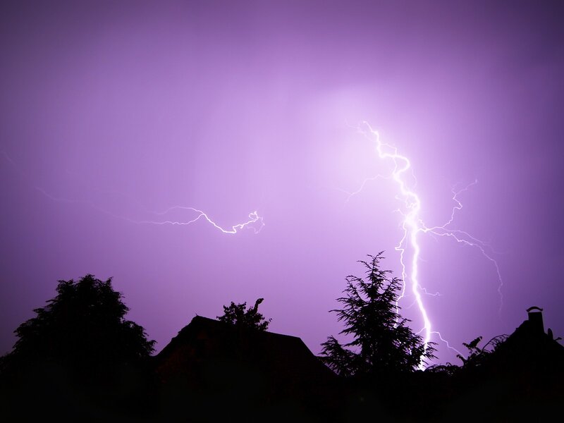 Lightning storm over rooftops