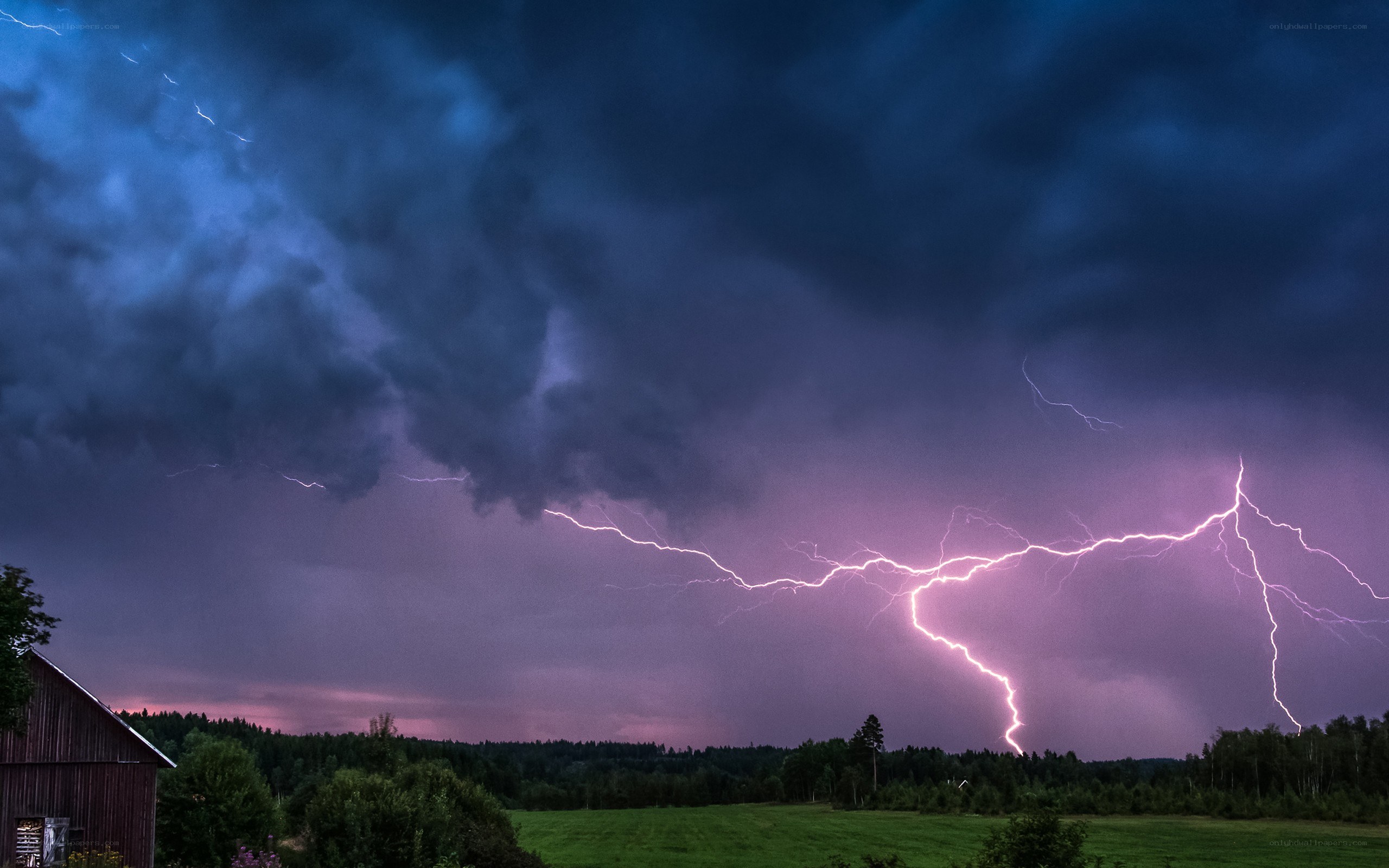Lightning storm over rural landscape