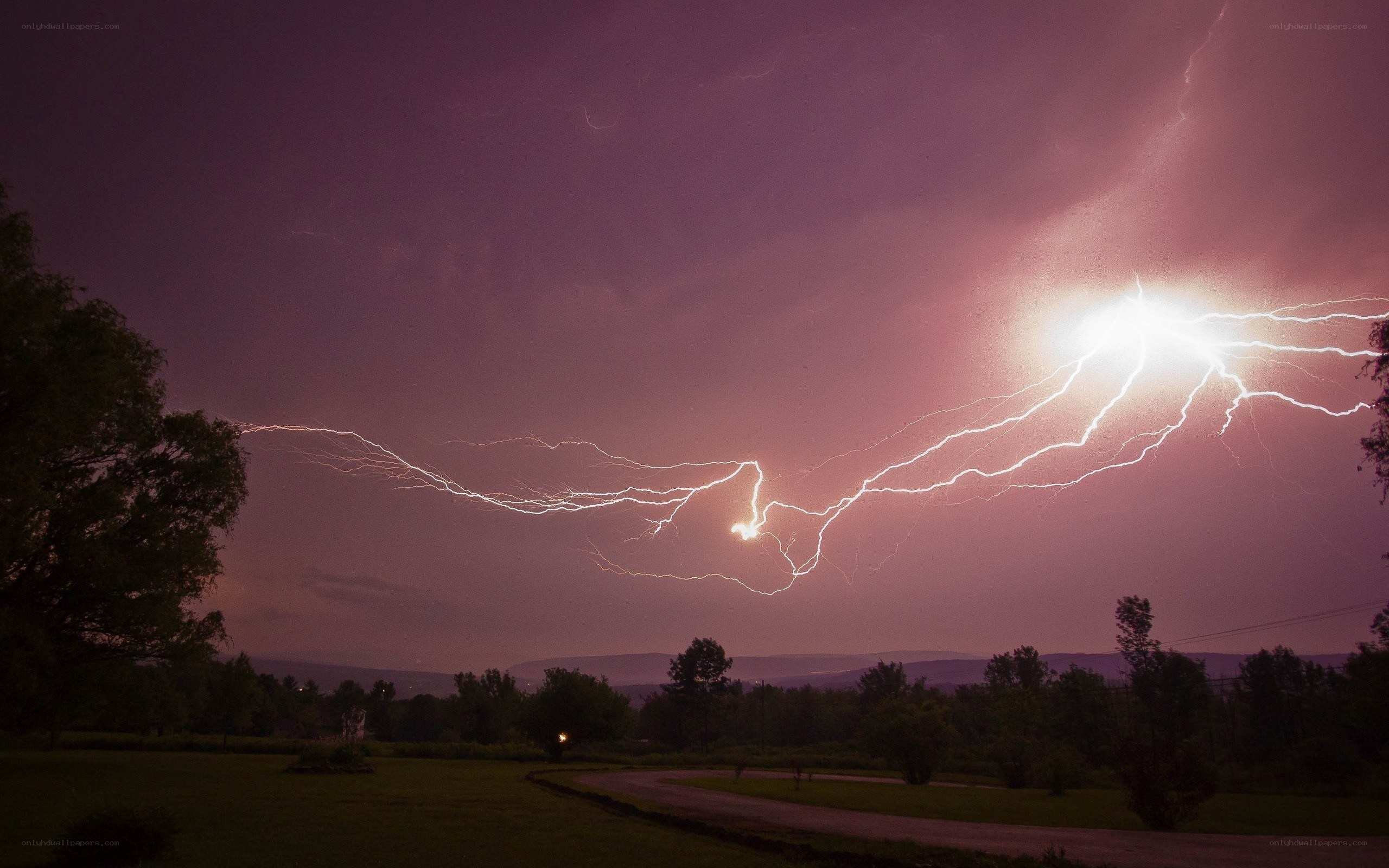 Lightning storm over rural landscape