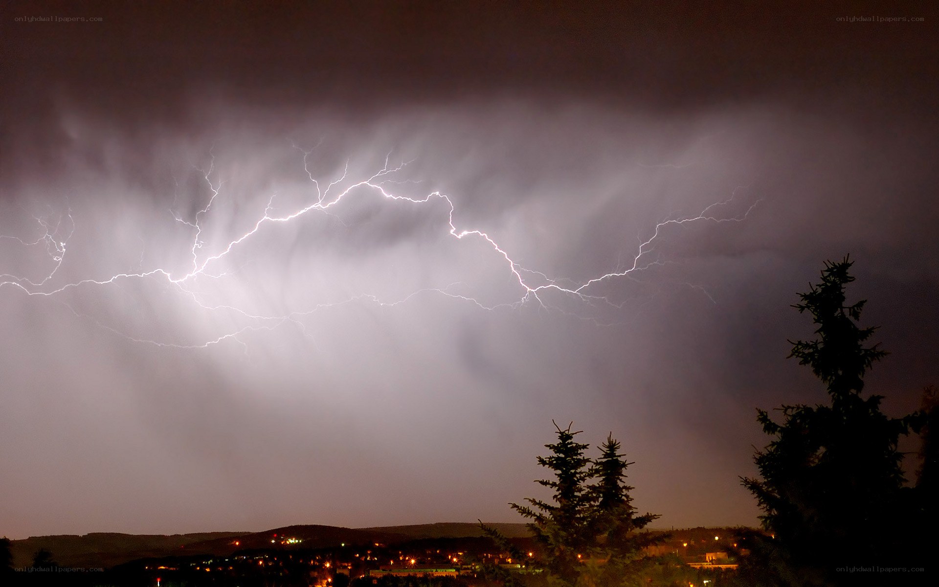 Lightning storm over town