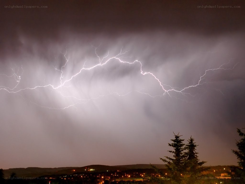 Lightning storm over town