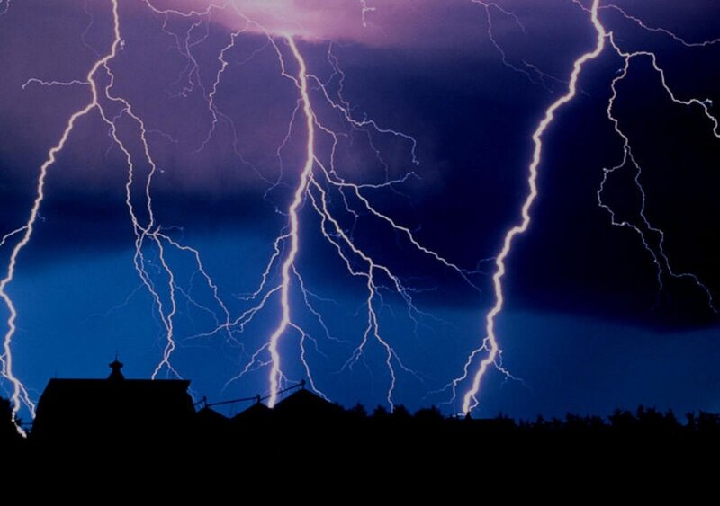 Lightning storm over village