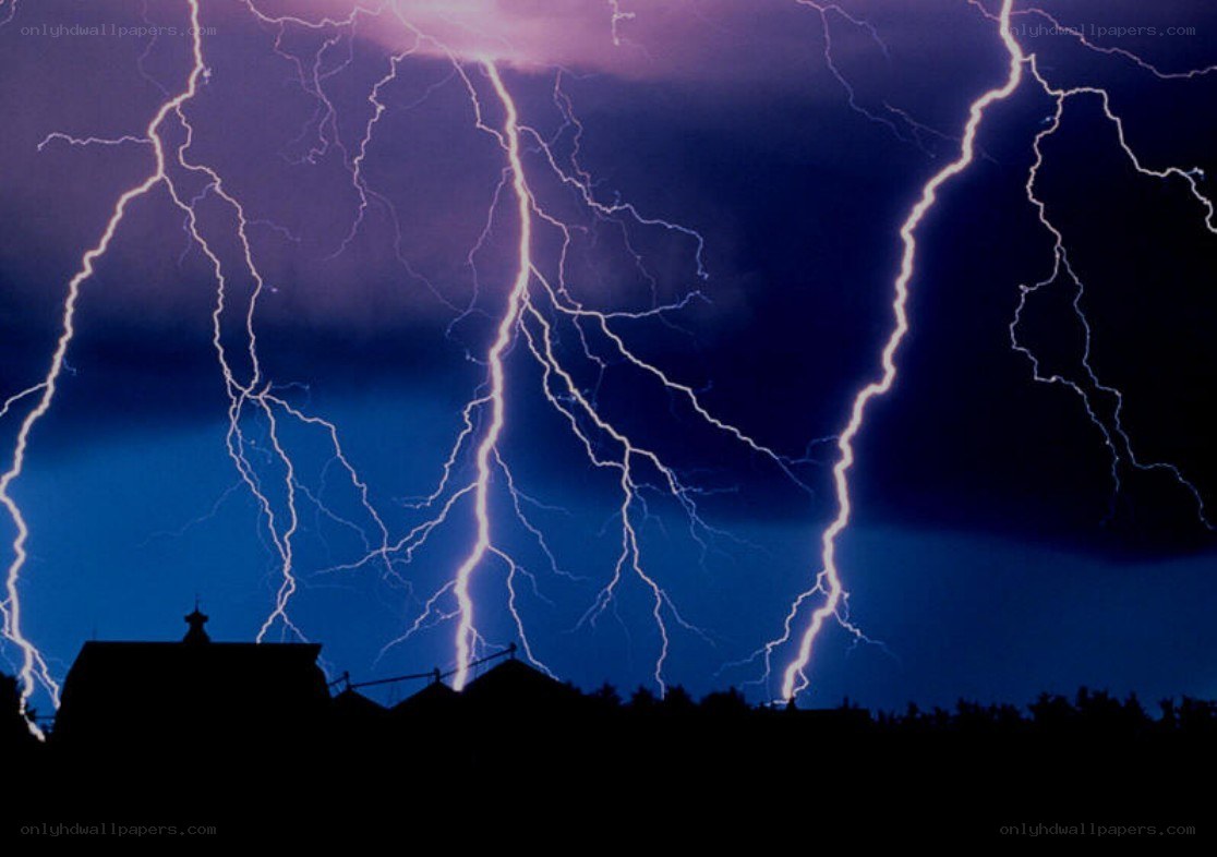 Lightning storm over village