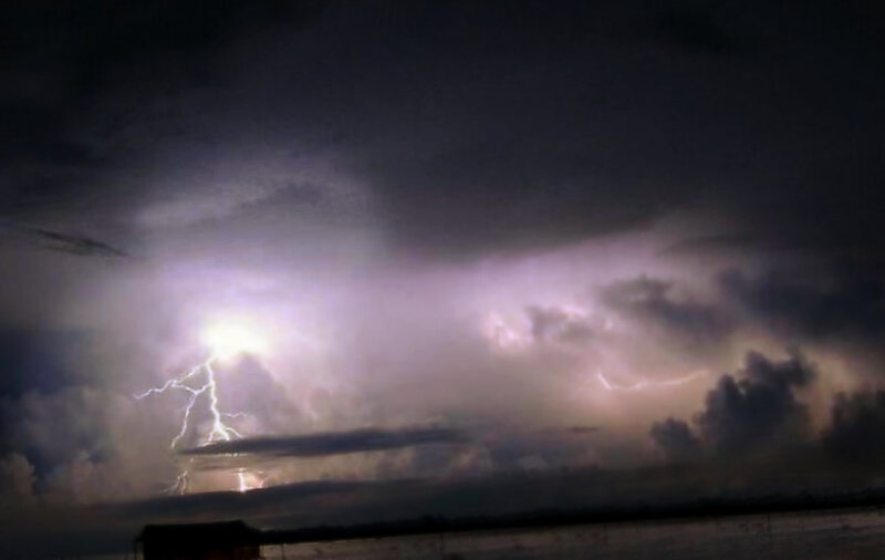 Lightning Storm over Water — Purple, Dramatic, Night, Photograph