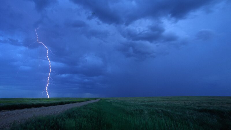 Lightning strike over a field