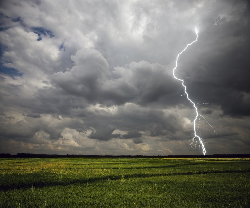 Lightning strike over a field