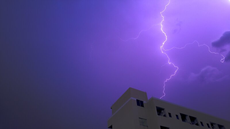 Lightning Strike over Building — Purple