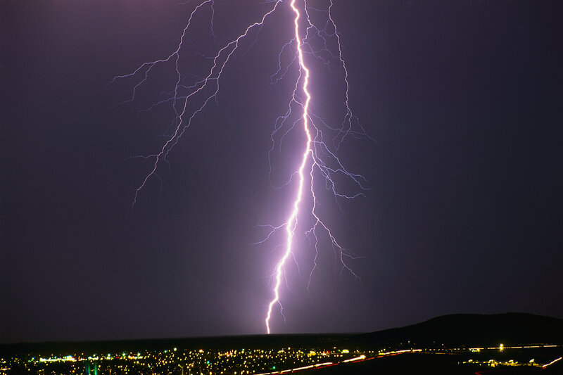 Lightning strike over city