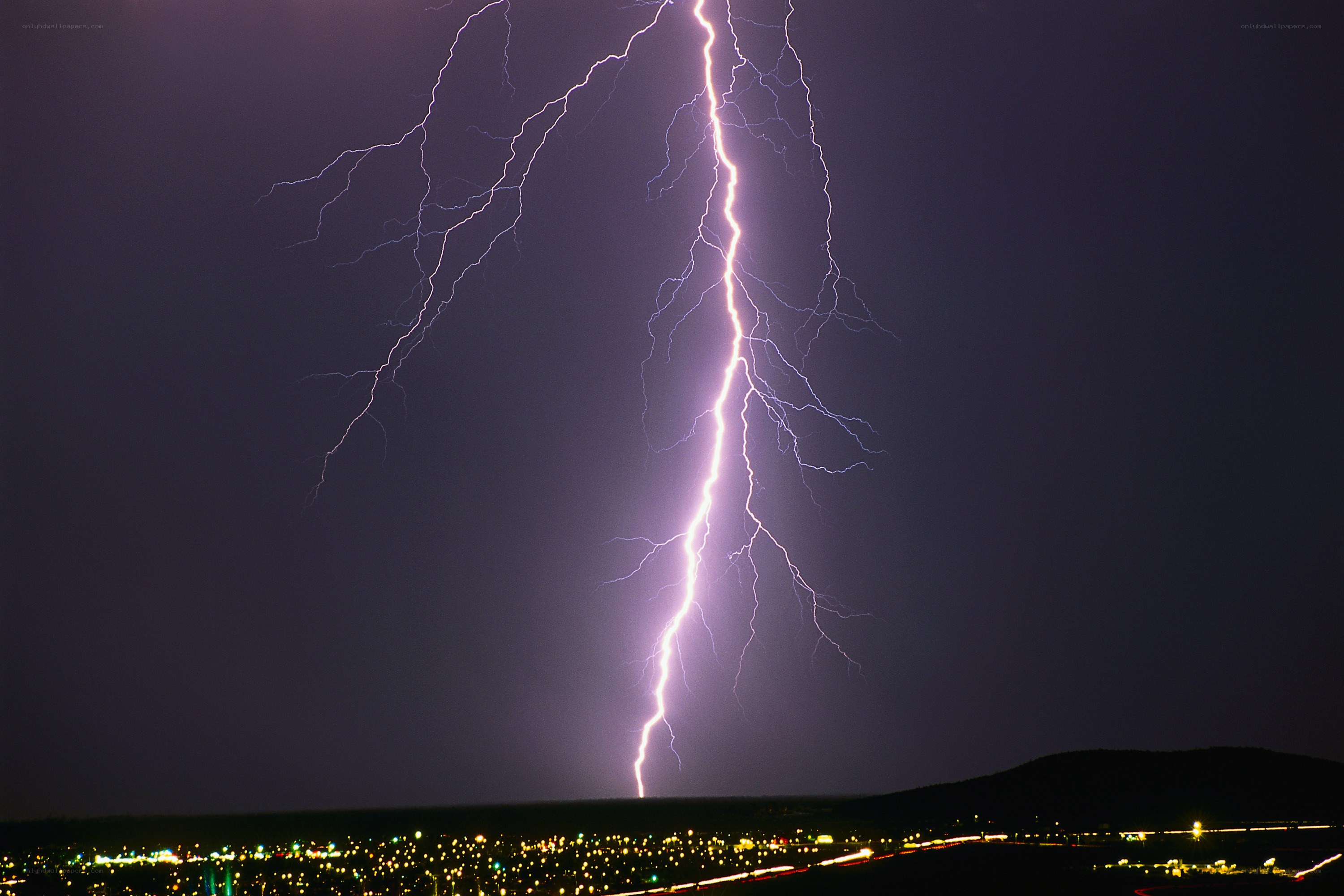 Lightning strike over city