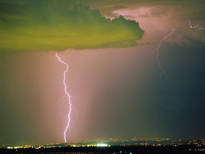 Lightning strike over city