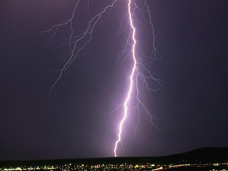Lightning strike over city