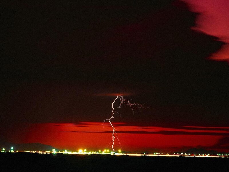 Lightning strike over city