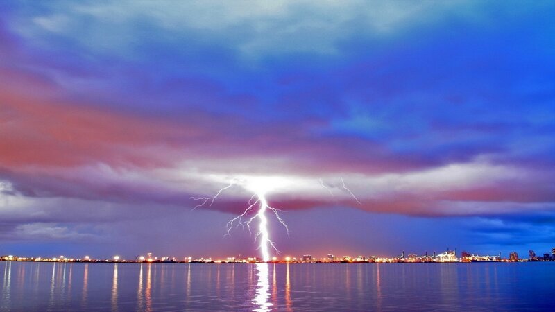 Lightning strike over city