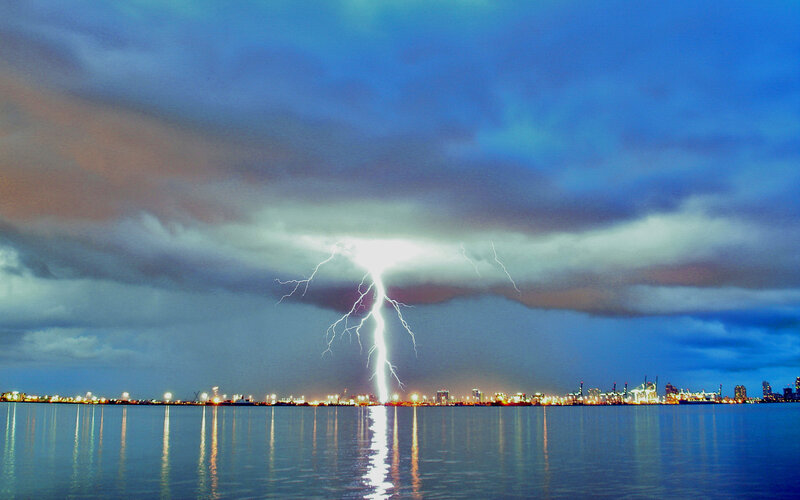 Lightning strike over city