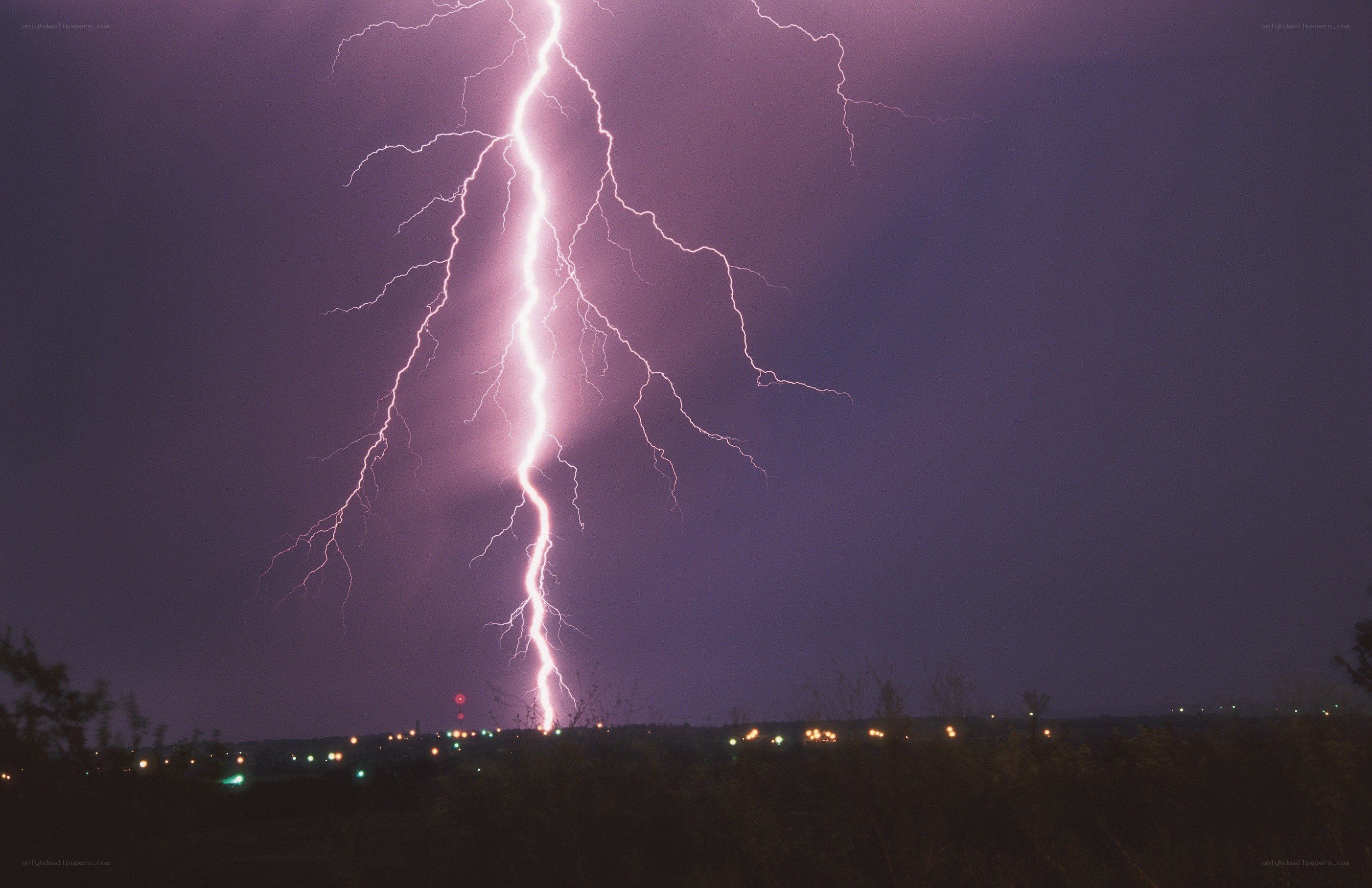 Lightning strike over city