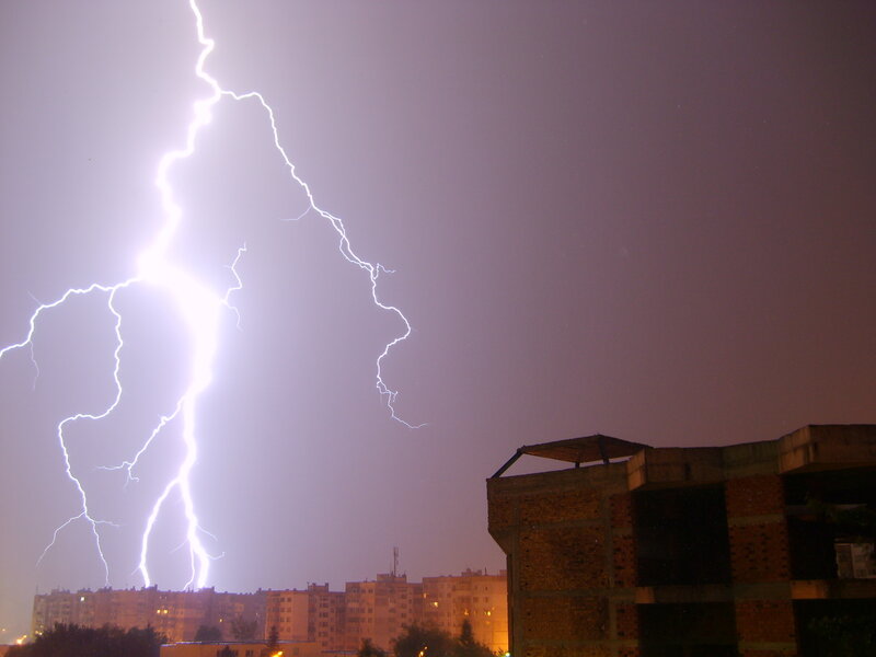 Lightning strike over city