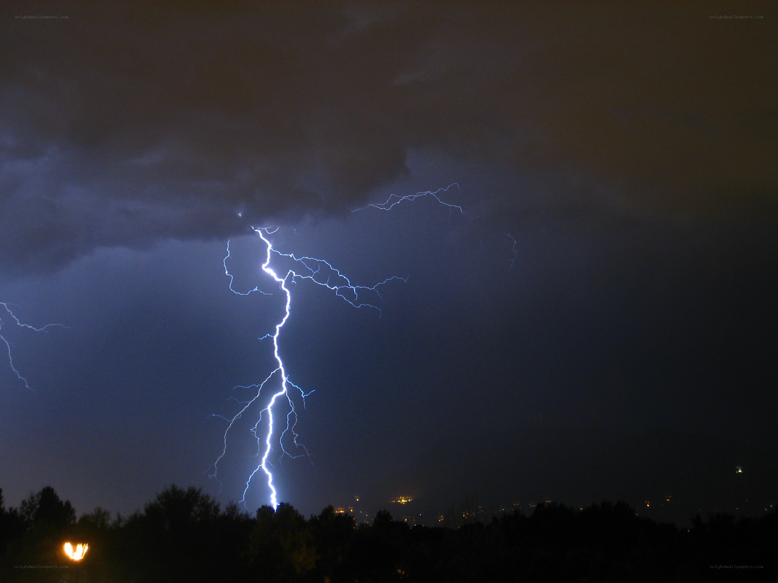 Lightning strike over city