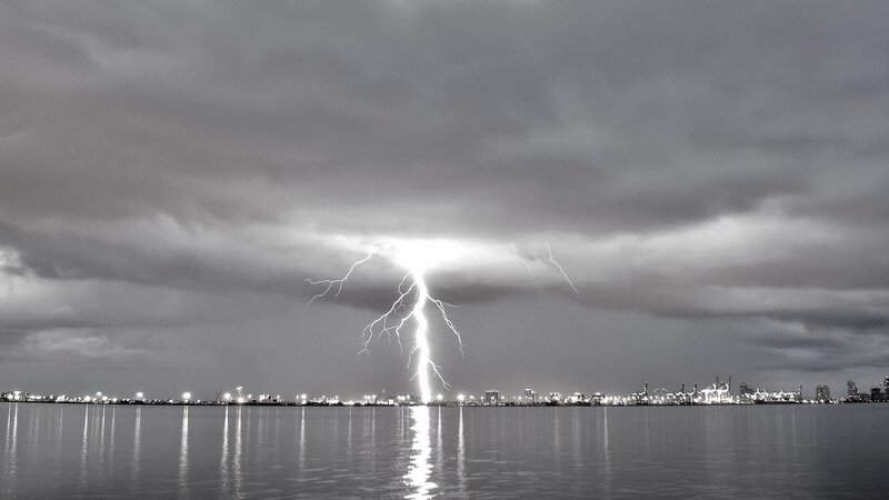 Lightning strike over city