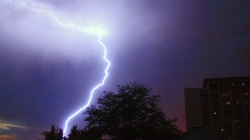Lightning strike over city