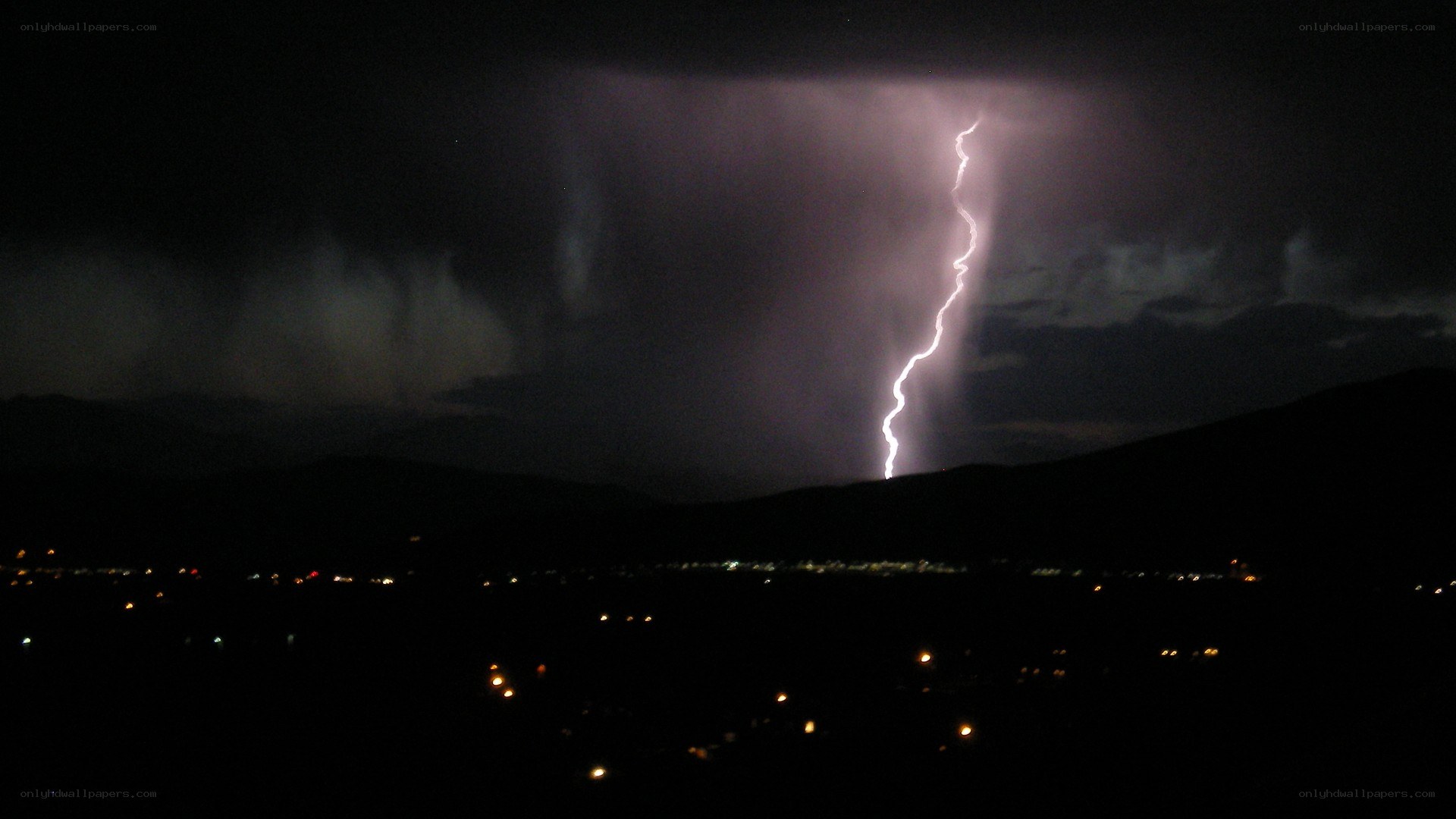Lightning strike over city