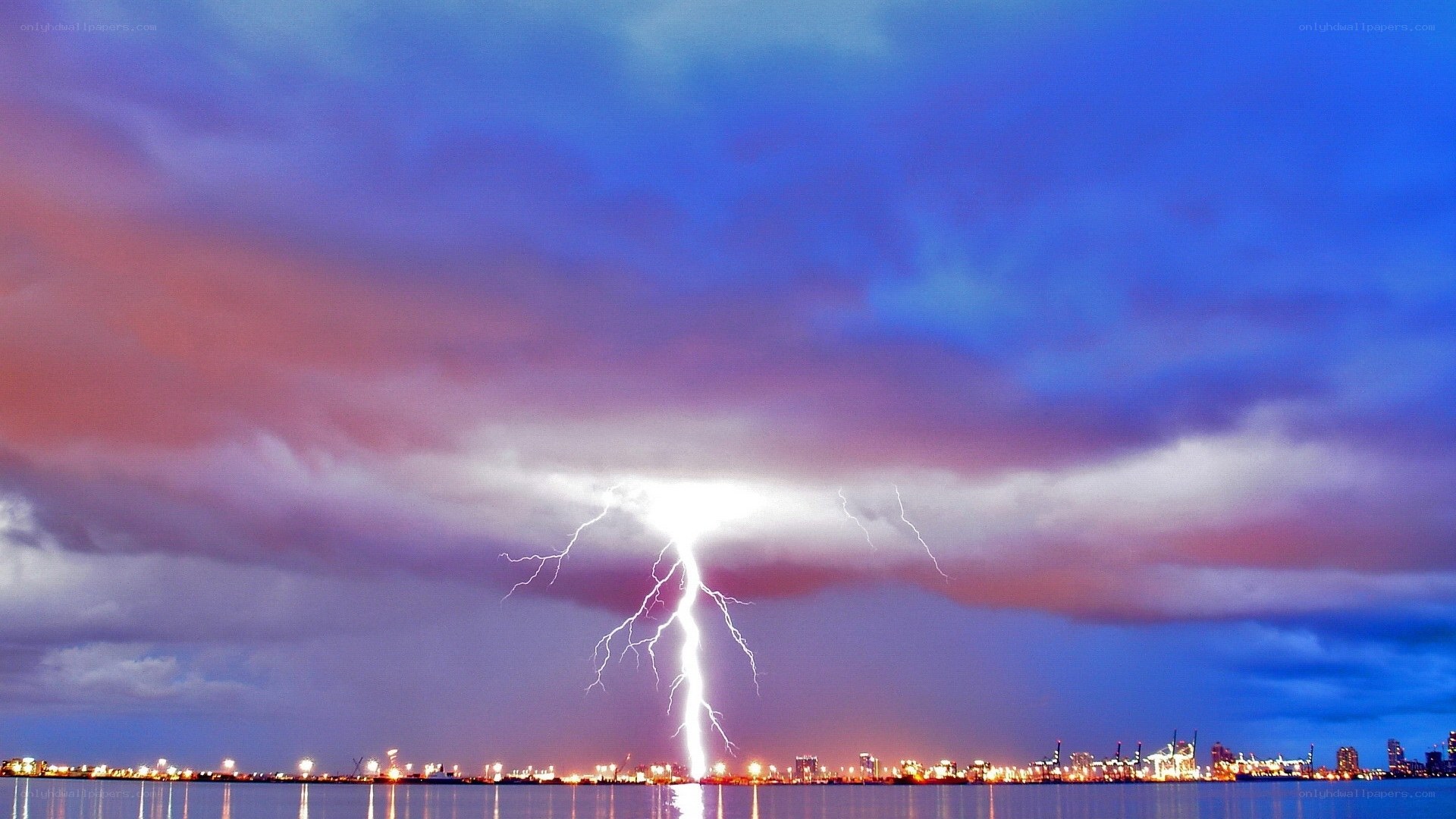 Lightning strike over city