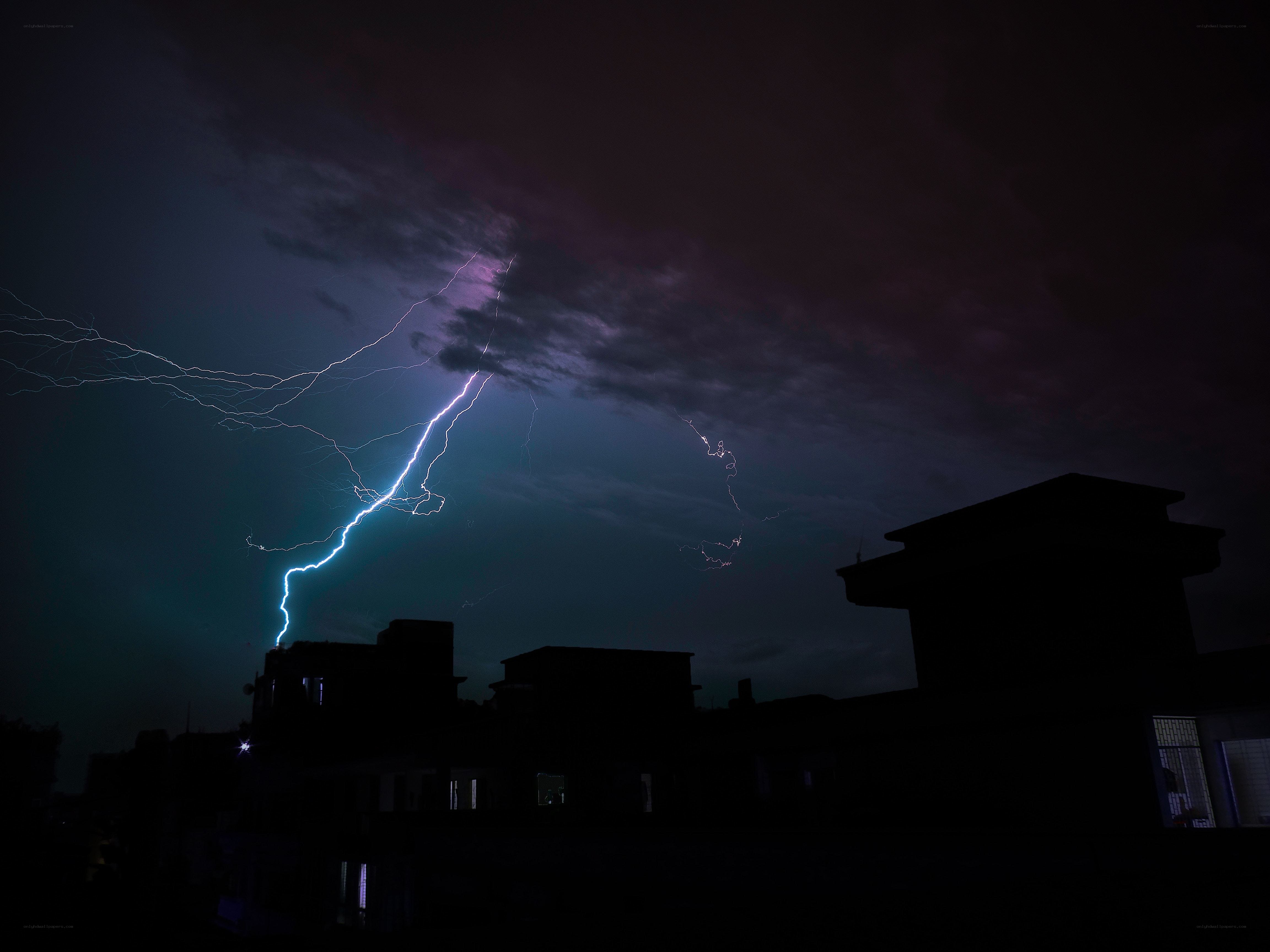 Lightning strike over city