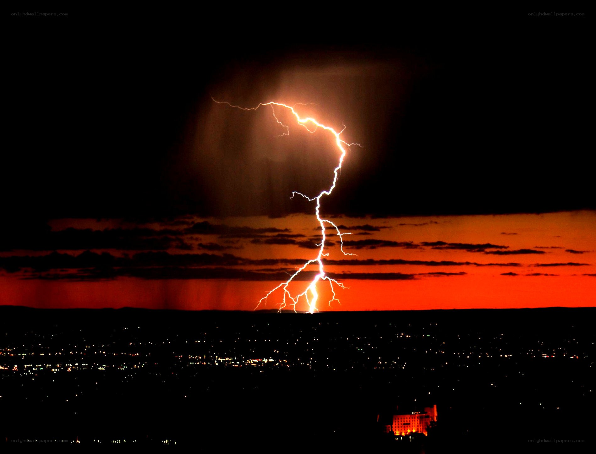 Lightning strike over city