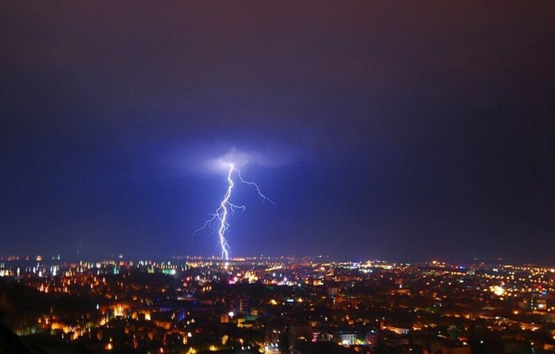 Lightning Strike over City — Blue