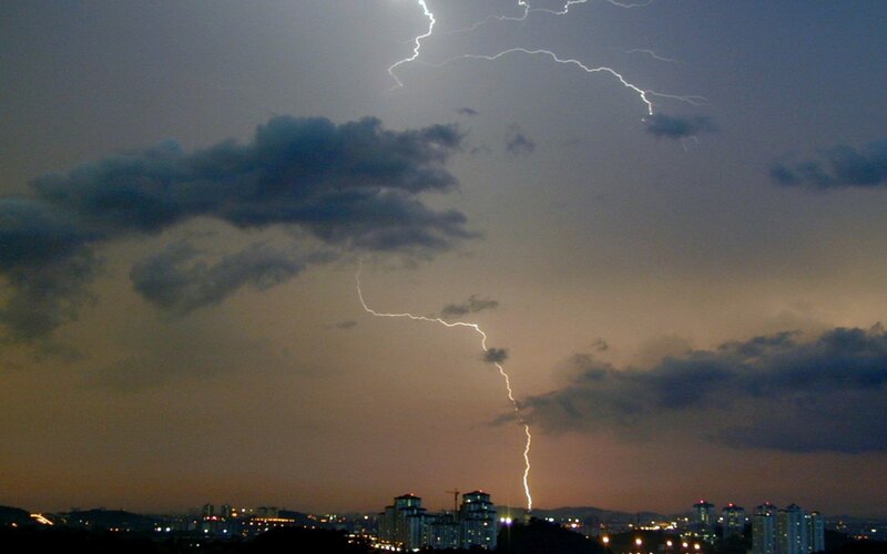 Lightning Strike over City — Gray, Dramatic