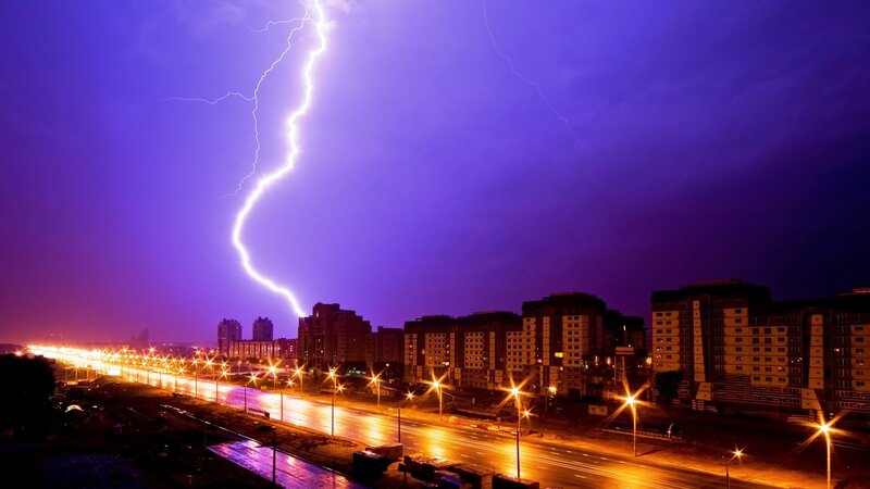 Lightning strike over city