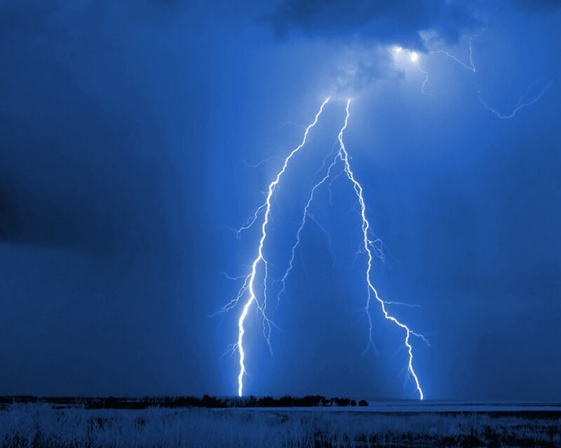 Lightning strike over field