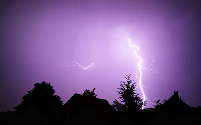 Lightning Strike over Houses — Dramatic