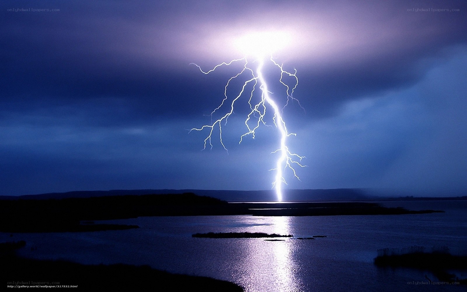 Lightning strike over lake