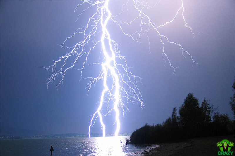 Lightning strike over lake