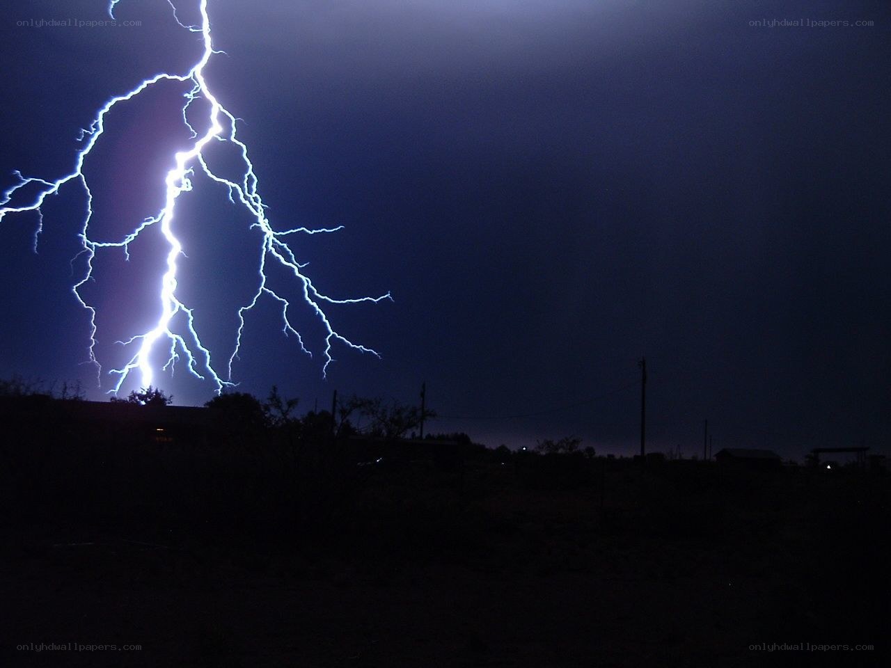 Lightning strike over landscape