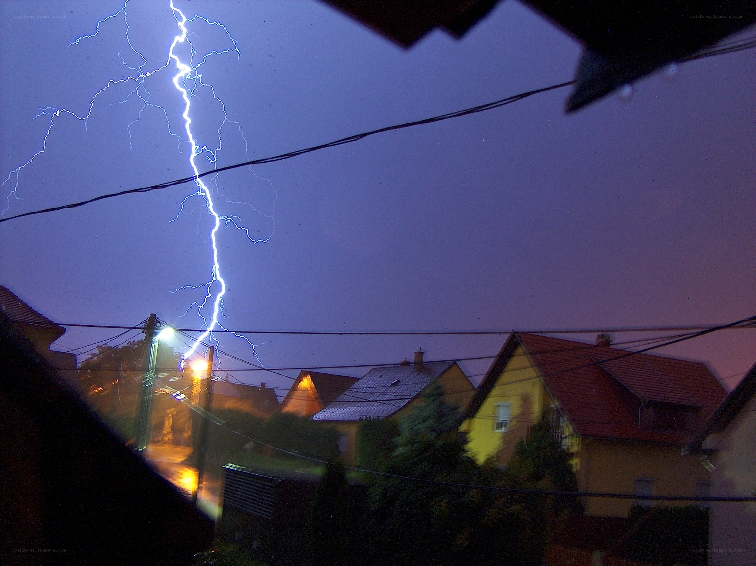Lightning strike over neighborhood